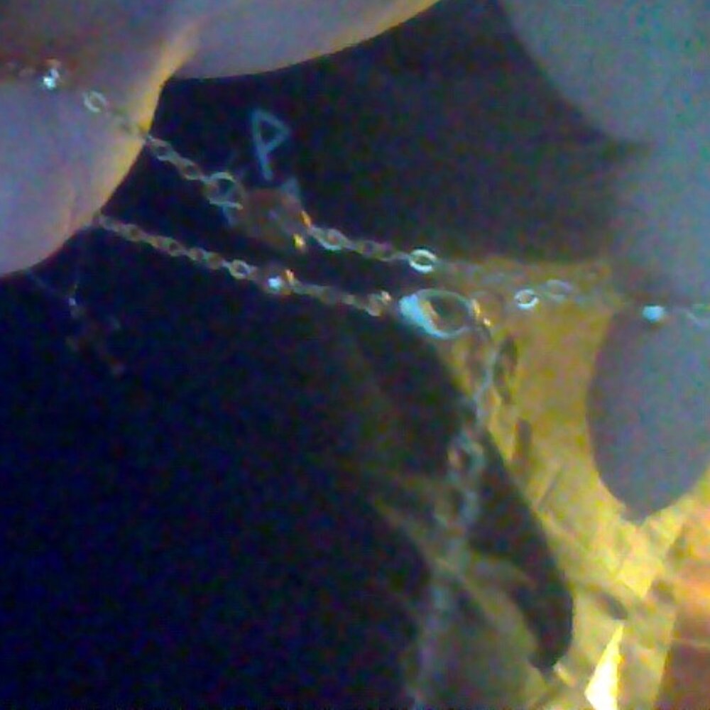 fine gold bracelet with a heart